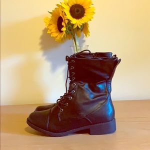 Black leather combat boots